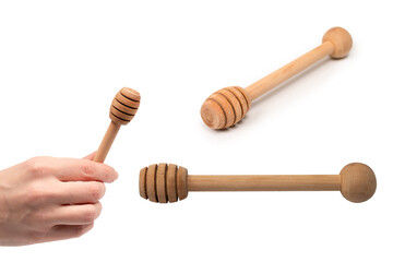 Honey dipper in woman hand isolated on a white background.