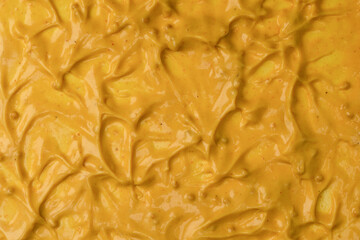 Yellow sauce splashes as a background.