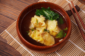 Dumplings in a soup bowl, Chinese or Asian food