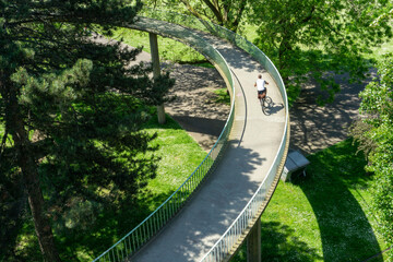 Urban Mobility in Nature. A Winding Bicycle Bridge.