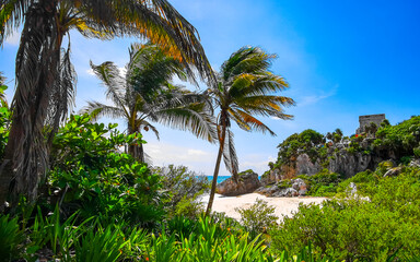 Fototapeta premium Rock at natural seascape panorama beach view Tulum ruins Mayan site Mexico.