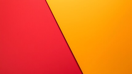 A vibrant image featuring a sharp diagonal split between red and yellow colors, creating a dynamic visual contrast.