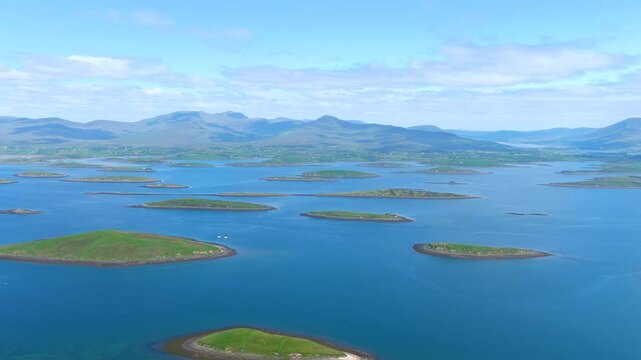 Aerial panorama of Clew Bay's archipelago of islands, partly drowned limestone drumlins formed by glacier. Aka Cuan Modha, one of nature's greatest spectacles when viewed from above. Co. Mayo, Ireland