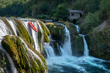 Rafting on the Una River, Waterfall in Strbacki buk on summer day, Una river. Bosnia and Herzegovina.