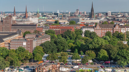 Aerial timelapse of Hamburg's historic city center skyline with iconic towers and spires. Germany