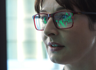 Business women viewing a graph showing company performance