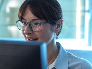 Financial analyst viewing stock market performance of a company share price.