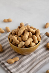 Organic Raw Peanuts in a Bowl, side view.