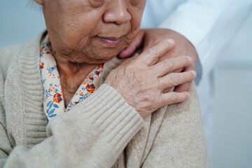Doctor holding hands Asian elderly woman patient, help and care in hospital.