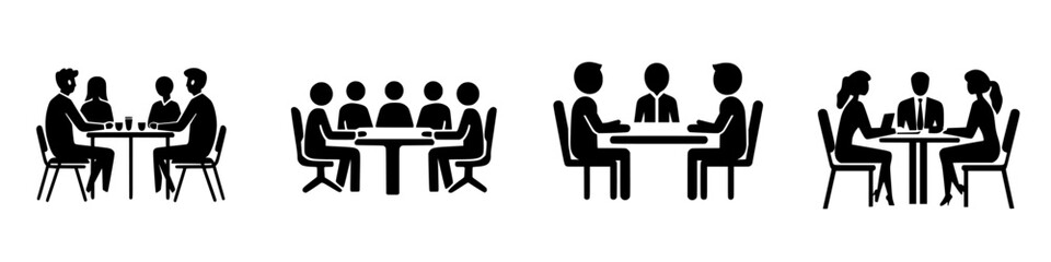 Groups of people engaged in discussions at tables in a modern setting during a business meeting