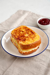 Homemade French Monte Cristo Sandwich with Raspberry Jam, side view.