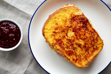 Homemade French Monte Cristo Sandwich with Raspberry Jam, top view. Flat lay, overhead, from above. Close-up.