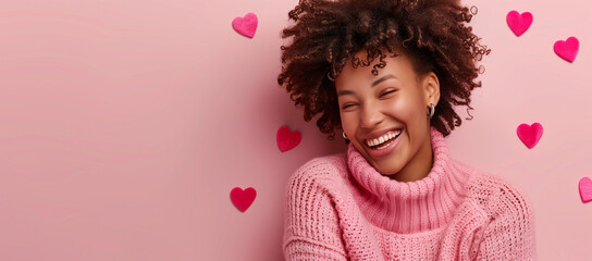  Close-up portrait of young woman in pink sweater with hearts background for valentine's day