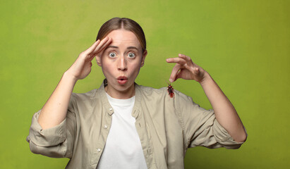 young adult blonde woman. cockroach concept