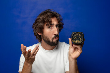 young adult bearded man with a fuel meter