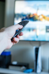 pointing a remote towards television