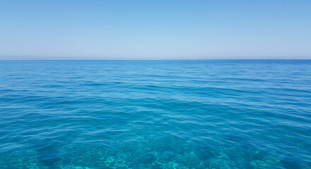 Obraz premium A Photo-Realistic Image of Deep Blue Ocean Waters, Capturing the Calm and Depth of the Sea in Stunning Detail, Perfect for a Serene and Majestic Ocean Photoshoot