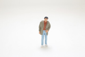 Small Figurine of Man in Casual Attire Isolated