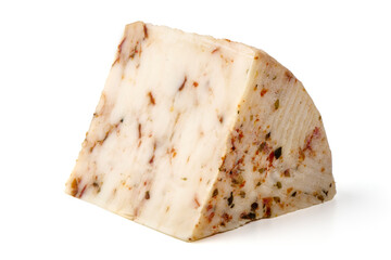 Seasoned cheese wedge with herbs and spices, isolated on white background.