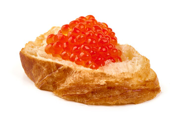 Red caviar on a crispy bread slice, isolated on white background.