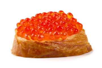 Red caviar on a crispy bread slice, isolated on white background.
