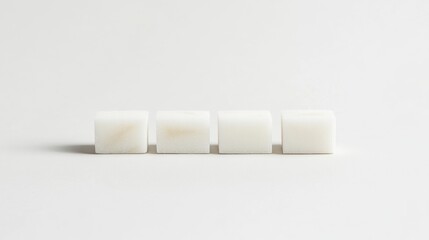 Minimalist White Cubes Aligned on Light Background for Contrast