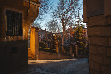 sunset over park and ancient streets of cozy European city Cuenca, Spain