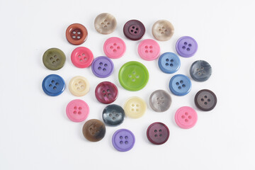 Four-hole buttons in various colors and sizes.