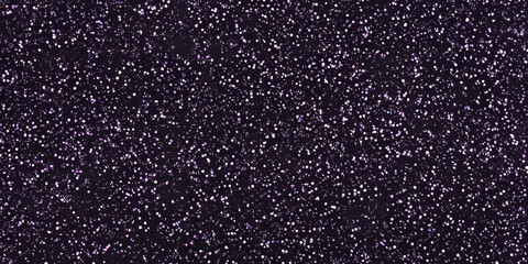 Obraz premium A royal purple glitter backdrop, with shimmering specks scattered throughout. The deep, rich color and sparkle make it perfect for luxury events, high-end branding, or glamorous fashion campaigns.