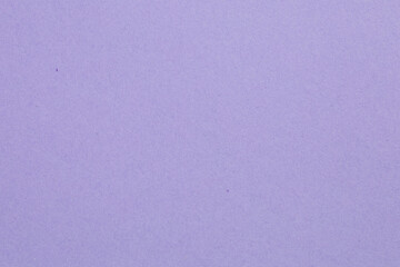 A purple background with a white line, textured origami paper backdrop