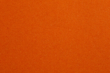 Orange background with a white line, textured origami paper backdrop