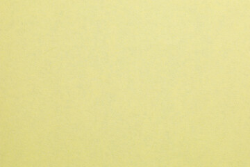 A yellow background with a white line, textured origami paper backdrop