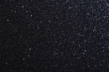 A black background with a lot of glitter