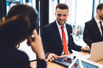 Happy colleagues working on project