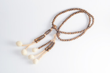 A wooden Juzu, a Japanese prayer beads, is a form of beadwork used to count the repetition of...