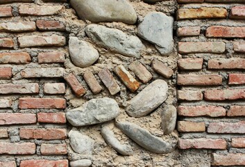 a wall built of bricks and stones