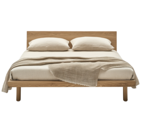 Wooden bed with soft linens and pillows