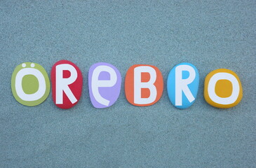 Orebro, city and capital of Orebro County, Sweden, creative text composed with multi colored hand...