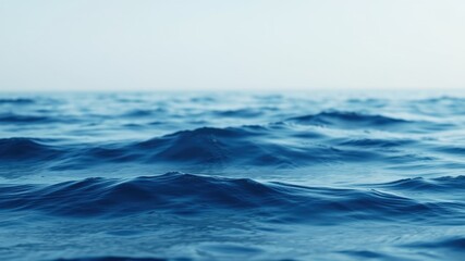 Fototapeta premium Serene Ocean Waves A Close-Up View of the Deep Blue Sea's Gentle Undulation
