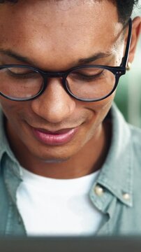 Eyewear, laptop and journalist in office, man editing news draft and email source to verify story. Closeup, publishing agency and online for column research, proofreading and reporter for spell check