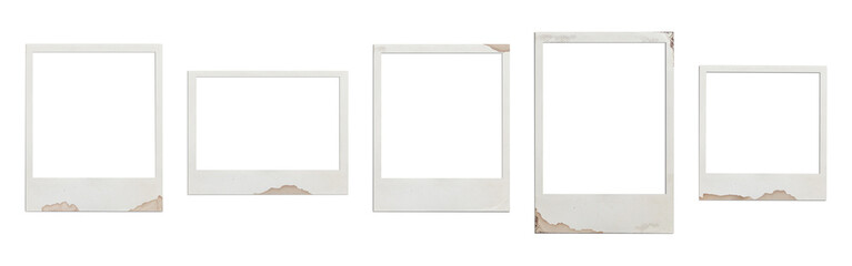A set of various real polaroid empty frames, old, yellowed with dark corners, with coffee stains,...