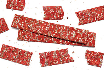 Fototapeta premium Beetroot dietic crackers on white background