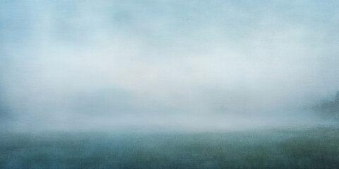 Obraz premium A misty chambray blue abstract background with soft fog-like textures, evoking a dreamy and atmospheric visual style.
