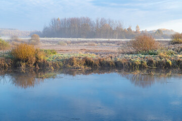 Sunny October morning on the Sorot river. Pushkinskie Gory. Pskov Region, Russia
