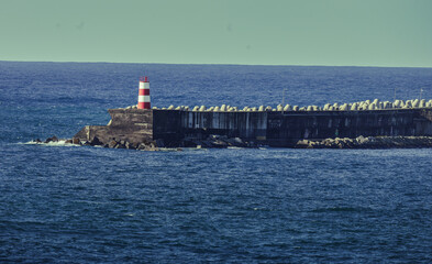 Porto Ponta Delgada Ancoradouro is a major harbor in São Miguel, Azores, serving as a key maritime hub for fishing, commercial shipping, and tourism, with docking facilities for boats, yachts, and cru