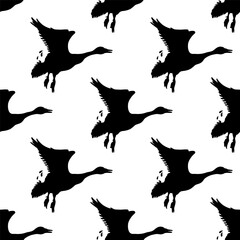 Canada geese. Black silhouettes of flying birds. Seamless pattern. Hand-drawn graphic design. Vector illustration on white background.