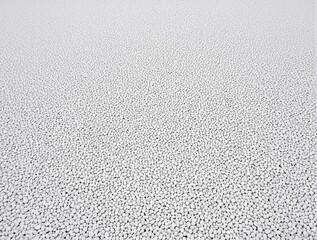 Obraz premium minimalist textured surface of small white pebbles, evenly spread stones with serene and calm appearance, uniform and continuous pattern