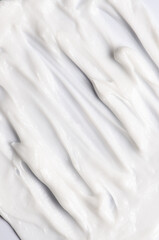 The texture of a cosmetic cream or balm