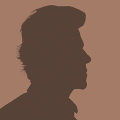 Silhouette of an adult man. Male avatar for social networks. Profile portrait. Mocha Mousse silhouette isolated on brown