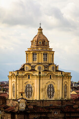 Naklejka premium Turin, Italy. Aerial view from palazzo Madama of the Church of San Lorenzo and its Guarino Guarini's Dome, in the central Piazza Castello.